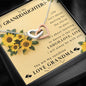 To My Granddaughter, Life Is About Dancing In the Rain Interlocking Heart Necklace